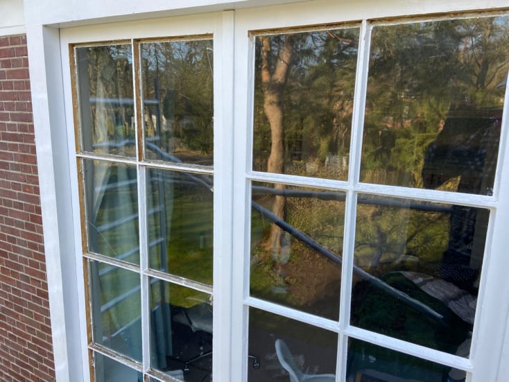 Unsightly appearance of unsealed window on the left compared to a much cleaner look on the right with sealant applied