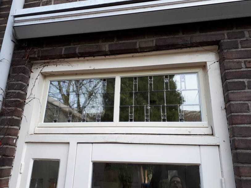 Outside view of a stained glass window in a house