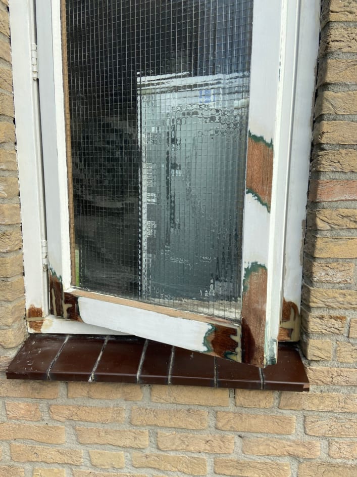 All decaying parts of window removed and sealed